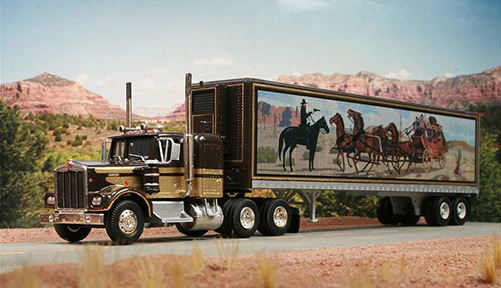 Black and gold semi with custom painted trailer